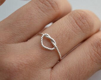 Don't promise me anything .Infinity heart . twisted silver ring