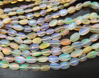29 Carats,16 Inches Strand,Natural Yellow ETHIOPIAN Opal Smooth Oval Shaped,Size 5-9mm