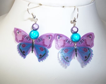 Earrings, turquoise and purple beads and butterflies.