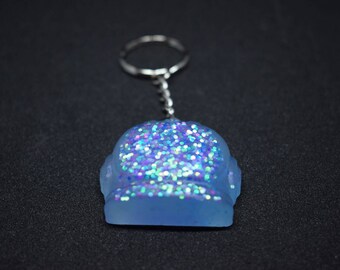 Keychain blue space helmet.