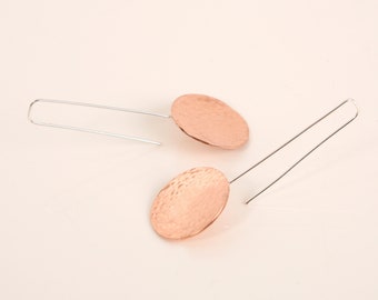 Large copper discs in hammered finish