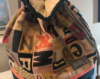 Perfect bag to take to Grandma's house. Stow clothes, toys, or precious treasures and your little tike is ready to go.