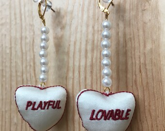 Doll parts earrings in pearl