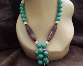 One strand turquoise necklace with cluster drop