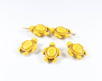 10 synthetic yellow Howlite turtle beads approximately 19 x 14 x 7.5 mm