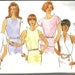 Butterick 4056 uncut size 18 - 22 five very pretty easy blouses