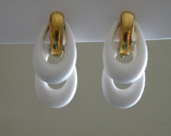 Trifari white plastic dangle drop clip-on earrings. 1960-s