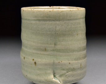 Unique Handmade Stoneware Yunomi glazed with Celadon, fired in reduction with a trace of Carbon Trapping
