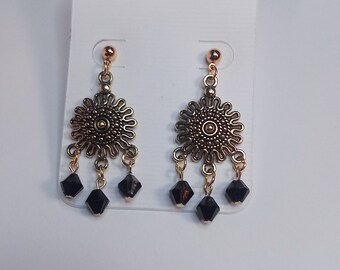 Gold tone medallion earrings