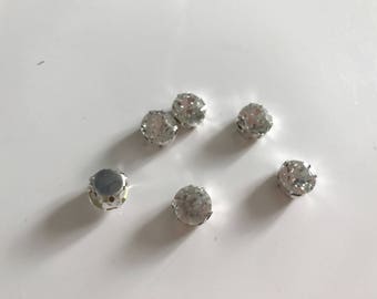 Rhinestone Crystal has sew silver 10 mm base