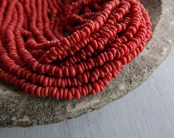 Mini tiny red rondelle lampwork glass beads, delicate, opaque semi matte, Indonesian ethnic 1 to 1.5 x 3mm ( 22 inches strand ) 7bb13-6