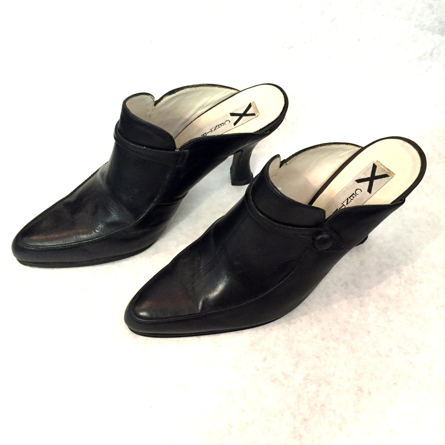 black leather high heel mules