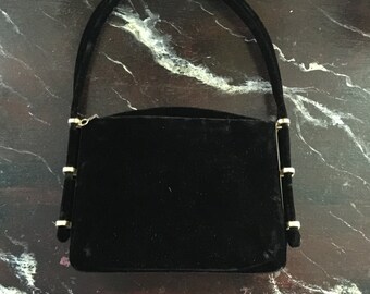 c handbag in black,circa1960,with silk satin on one side and velvet on the other. Mint