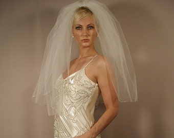wedding veil 2 layer elbow length 30" long with pencil edging.