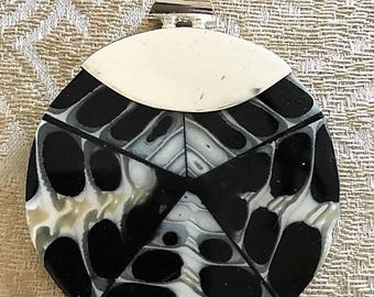 Shell Pendant set in Sterling Silver