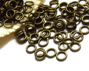 50/100 Antique Bronze Jump Rings 6mm, Closed Loop - 11-6