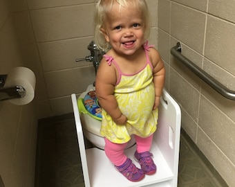 Get up and GO Potty Helper Two-Step Stool. Has 4 handles for ease of use. Sturdy and solid, glued and screwed. Fits your toilet! - WHITE