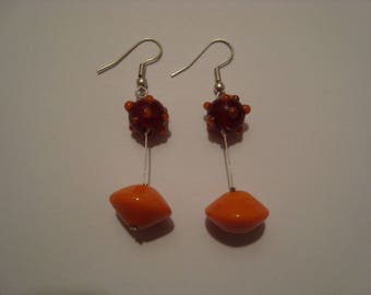 Earrings combine orange and Burgundy