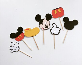 Mickey mouse cupcake toppers or appetizer picks.