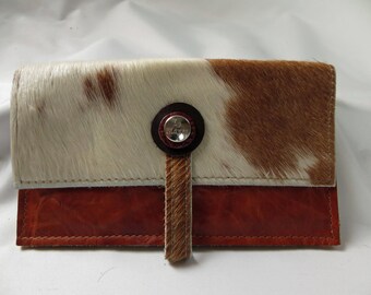 leather purs with brown/white cowhide