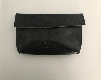 Distressed black clutch