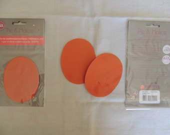 1 pair of elbow/knee pads on Orange clothing