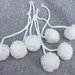 Big white 2" pompoms with tails, white pompoms, big pompoms, blanket pompoms, pillow pompoms