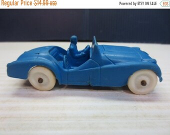 vintage Auburn toy car Indy style race car yellow rubber car