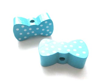 Wooden bow - Turquoise with white dots bead