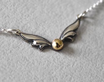 Magical Winged Ball Sterling Silver Necklace.