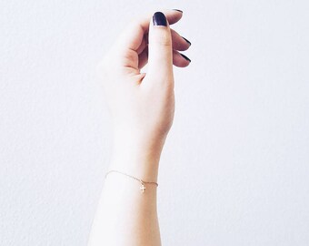 Tiny gold cross bracelet - simple dainty - thin chain bracelet - charm bracelet - delicate - illusy