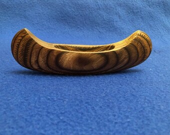 Handcrafted wooden canoe