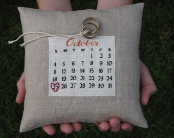 a custom calendar ring pillow... choose your date