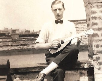 Vintage Snapshot "Ain't We Got Fun" Ukulele Musician Handsome Young Man Rooftop Found Vernacular Photo