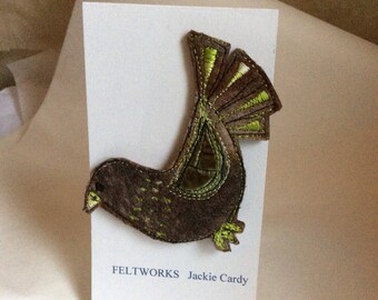 Embroidered bird brooch