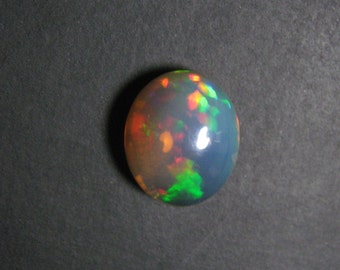 Natural Ethiopian opal Oval shape cabochon loose semi precious gemstones size 11 x 10 mm code 5657 Wholesale Gemstone