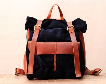 Suede/ Oiled leather roll backpack with pocket