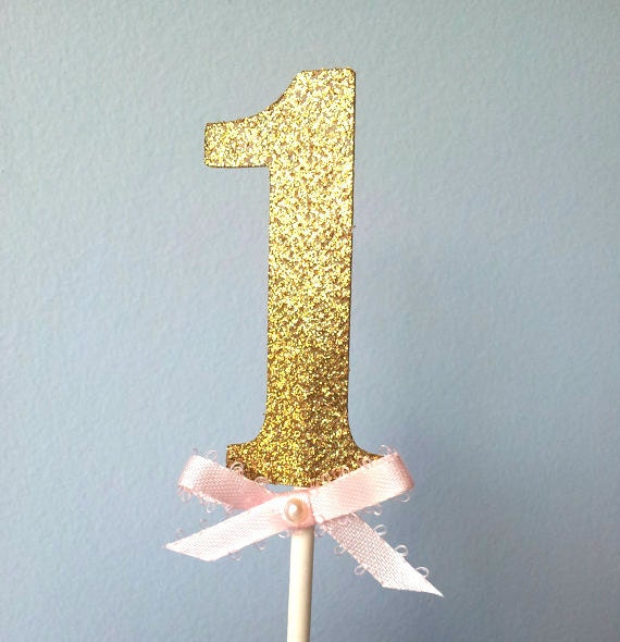 Gold glitter Number 1 cake topper with pink bow cupcake