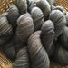 Twisty Face / In the Dark / kettle dyed / hand dyed superwash blue faced leicester wool / indie dyer / ooak yarn / fingering / bfl sock
