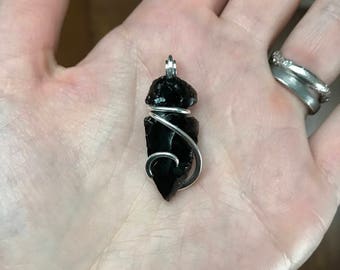 Obsidian arrowhead in sterling silver pendant