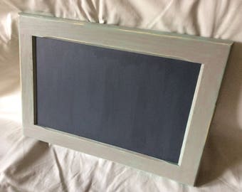 Jade green memo Board is aged and weathered