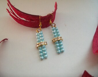 Gold and mother of Pearl Earring