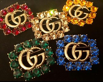 Gorgeous Crystal embellished decorative metal double G pin brooch