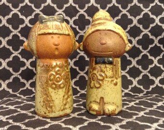 vintage stoneware couple salt and pepper shakers