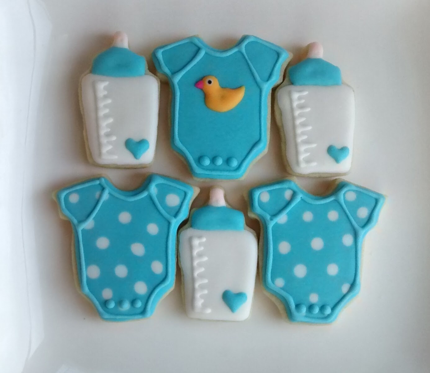 Baby boy shower birthday party sugar cookies decorated with