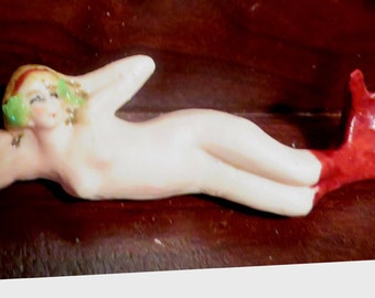 Bisque Mermaid with blue flowers in her hair