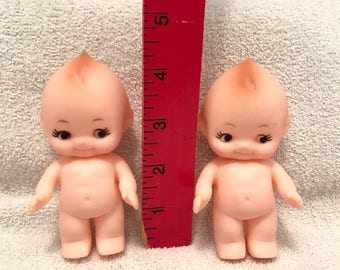 Two Small Plastic Kewpie Dolls