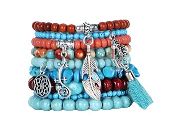 Beaded Bracelets Set of 9 Stretch Bracelets Bohemian Southwestern Themed Stack with Silver Tone Charms and Tassels