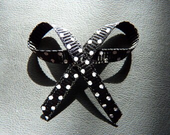 Pretty bow with black decorated with Ribbon