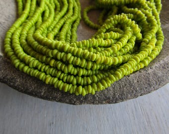 mini tiny lime green rondelle lampwork glass beads delicate, opaque semi matte tone Indonesian discs 1 to 1.5 x 2.5 mm / 22 inch 7bb13-12